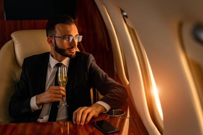 A leader working aboard a private flight